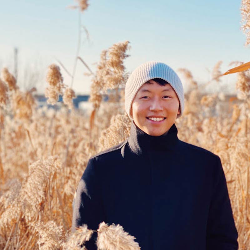 Charlie Wang portrayed